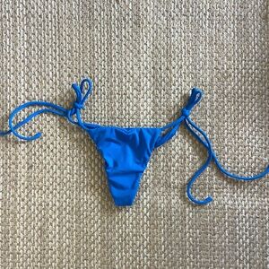 Indah “Collins” Bikinj Bottom